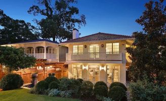 25-ansley-park-atlanta-white-brick-house-at-dusk.jpg