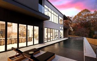 33-atlanta-modern-luxury-estate-pool-and-estate-at-dusk.jpg
