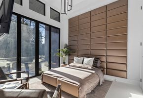 16-atlanta-modern-luxury-estate-bedroom-padded-headboard.jpg