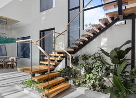 07-atlanta-modern-luxury-estate-floating-staircase-indoor-garden.jpg