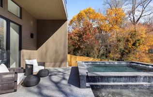 32-atlanta-modern-luxury-estate-pool-spa-and-seating.jpg