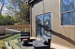 34-atlanta-modern-luxury-estate-outdoor-balcony-lounge.jpg