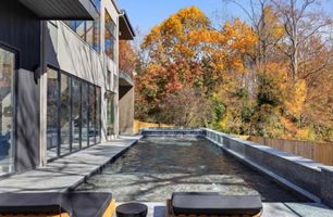 05-atlanta-modern-luxury-estate-pool-deck-and-lounge-chairs.jpg