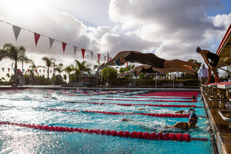 San Diego State team photographer covering a swim meet at the Aztec Aquaplex against Pepperdine Swimming Sports Photography