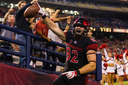 San Diego State Aztecs tight end Parker Houston (82) catches a 25 yard touchdown pass in the second quarter to give the Aztecs a 10-3 lead. The San Diego State Aztecs beat the Eastern Michigan Eagles 23-20 in over time at SDCCU Stadium in San Diego, California. San Diego State Football Touchdown Celebration