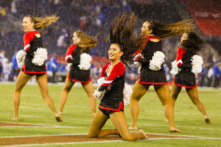 The San Diego State dance team performs during a media timeout as the rain intensifies. San Diego State Dance Team