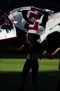 A member of the SDSU color gaurd perform prior to the San Diego State Aztecs football team opening up the season at home against the University of New Hampshire Wildcats. FOOTBALL: San Diego State v University of New Hampshire