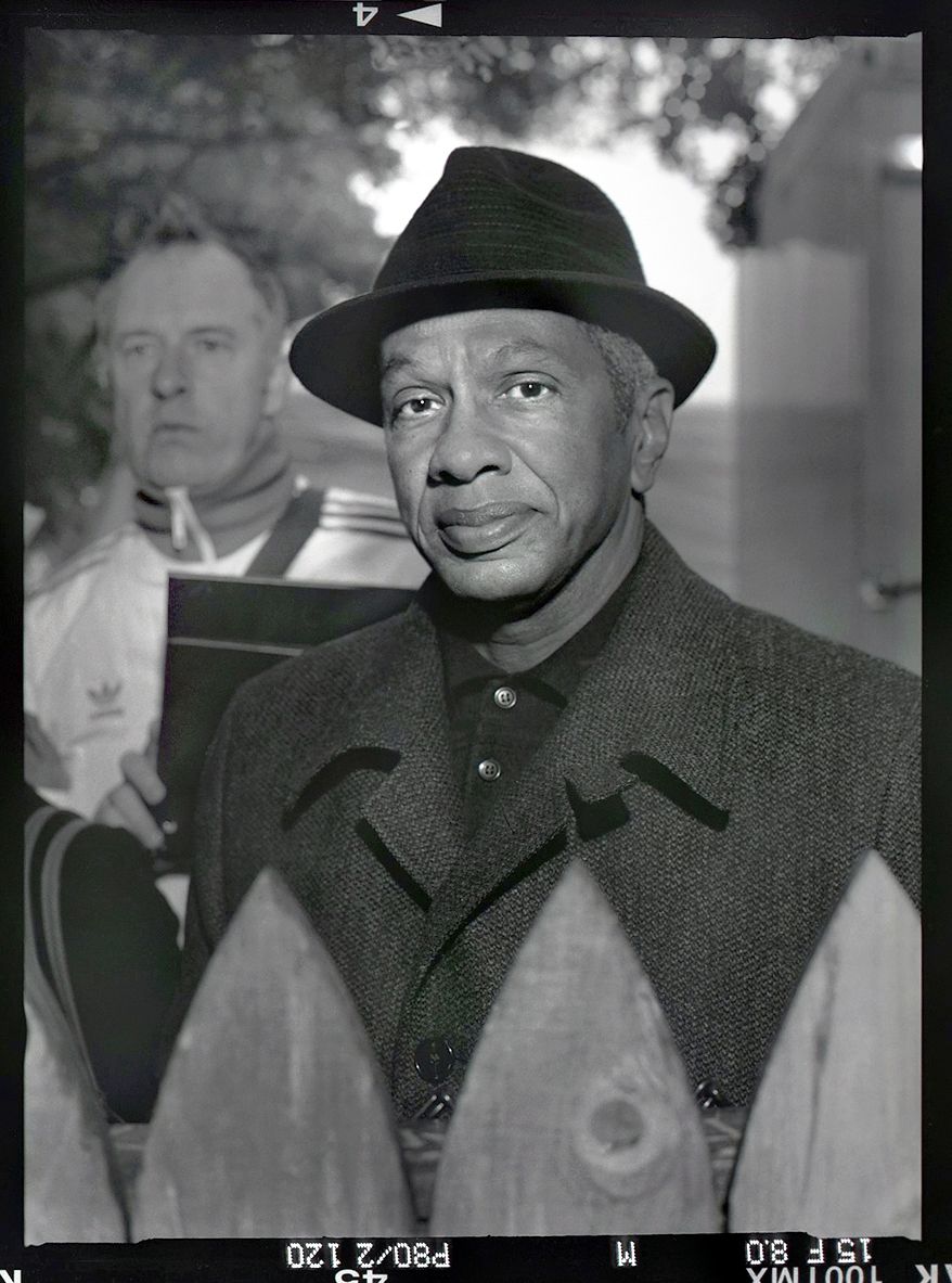 SHAWN MUHAMMED, AS A CHILD IN DALLAS SAW JFK DRIVE THE SECRET SERVICE AROUND AND SHOP FOR TIES; "HE WAS A REGULAR GUY".