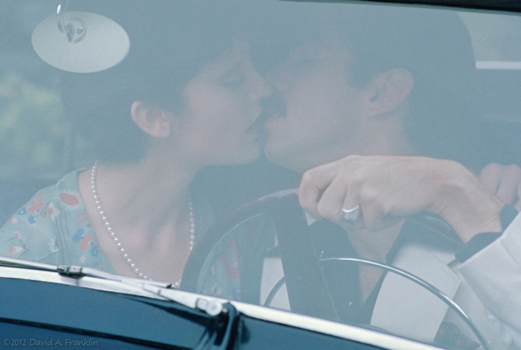 Male&FemaleModels_PeriodClothing_Kissing_ThroughWindshield_1941Lincoln_Personal
