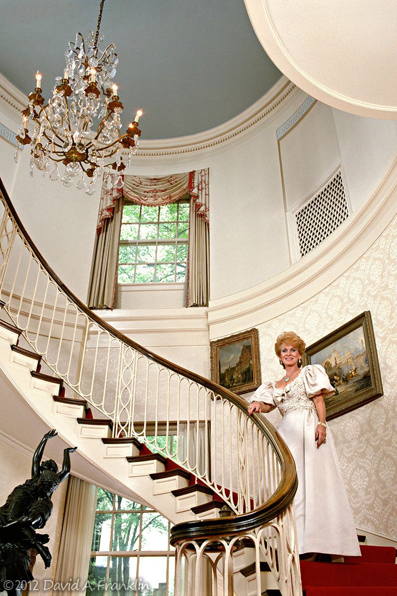LadyOfTheHouse_OnSpiralStaircase_GrossePointeMansion_MagazineCover