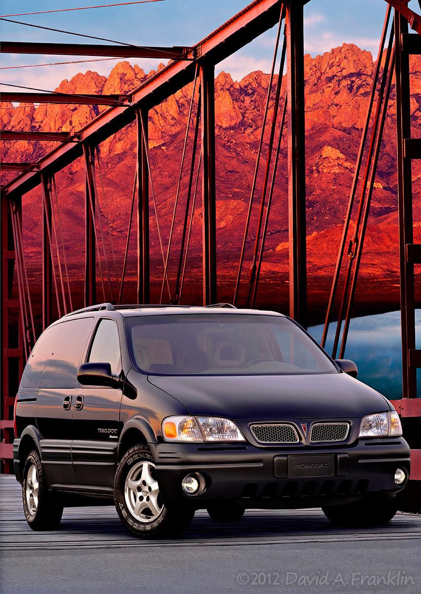 PontiacMontana_Black_F78_OnRedSteelBridge