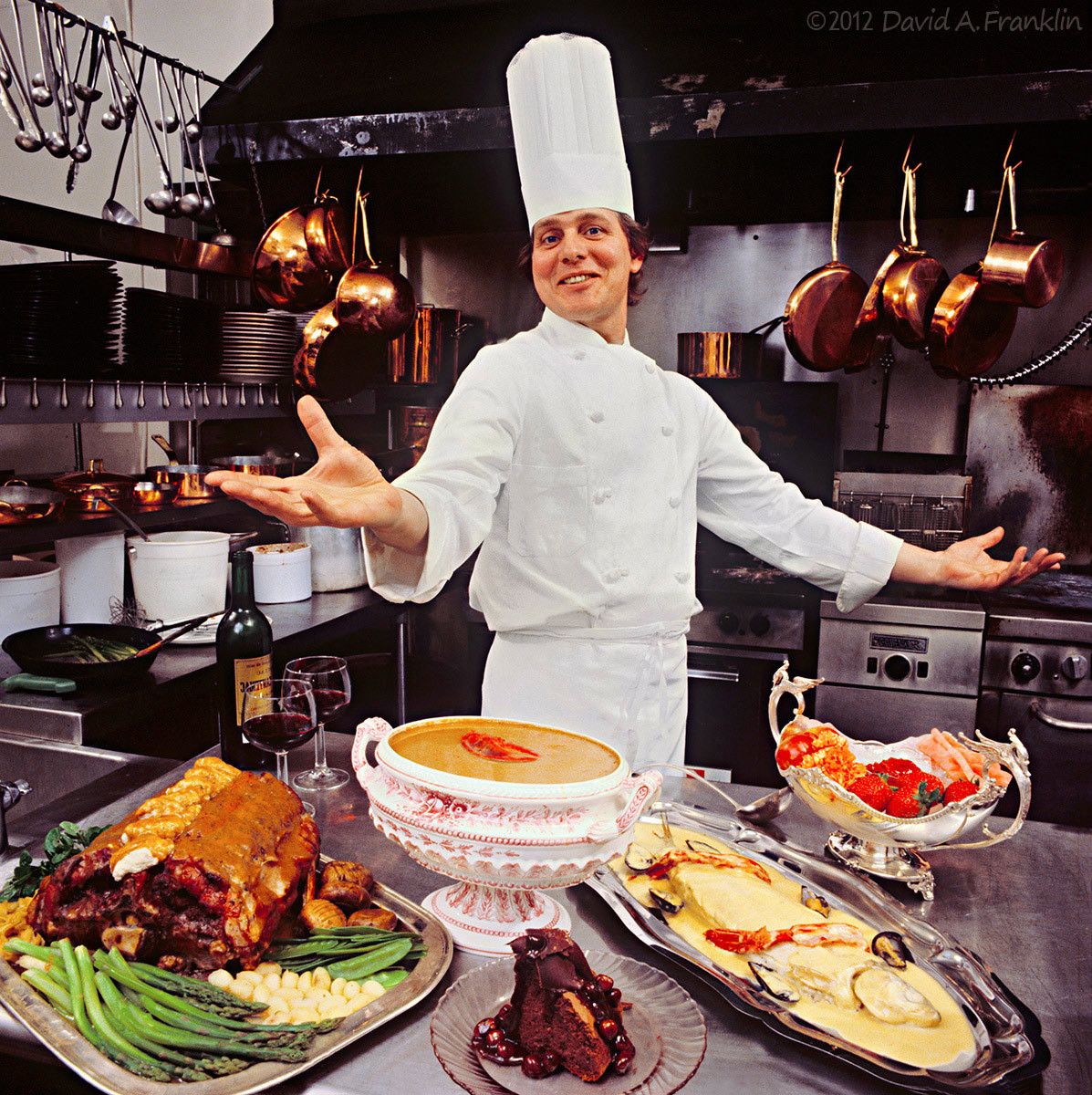 DouglasGretsch_Owner-Chef_RestaurantDuglass_FoodArrangedInFront_Kitchen_MagazineCover