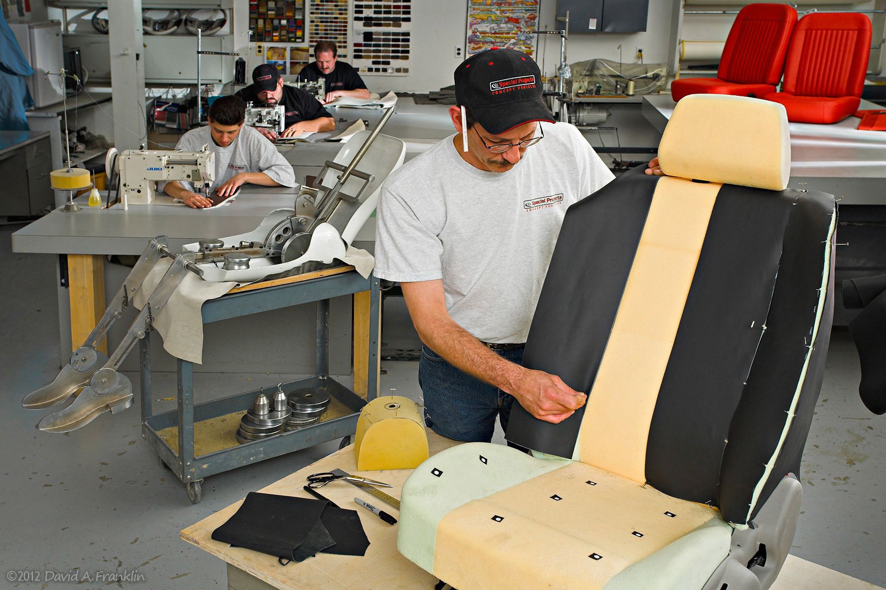 WorkingOnAutomobileSeatForm_TextileRoom_SpecialProjects_Advertising