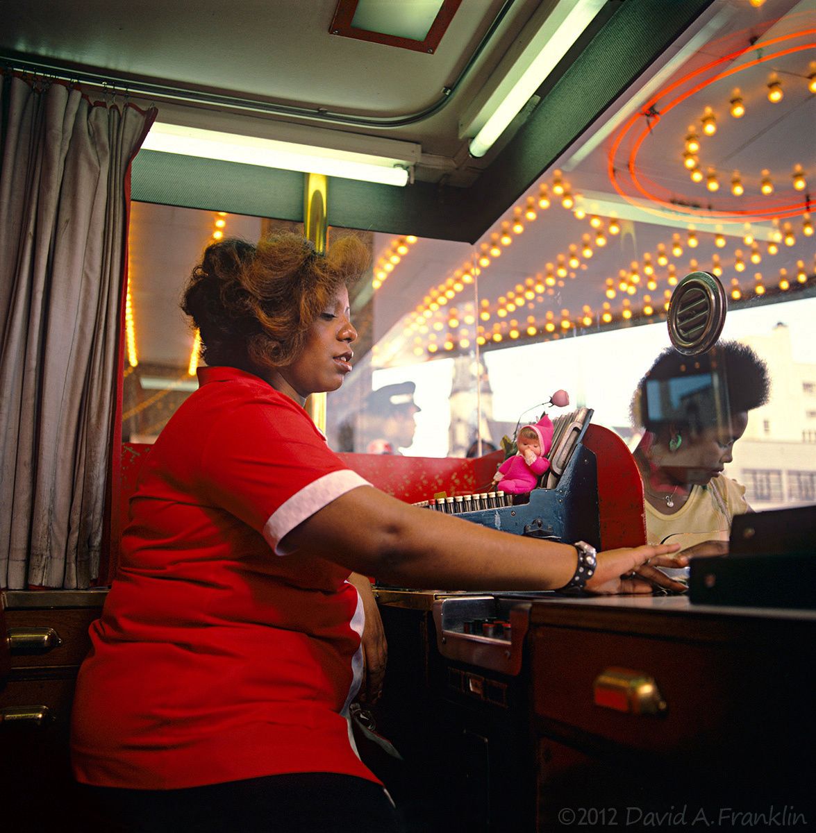 PalmsTheaterTicketSeller_SandraKoger_DowntownDetroit__Editorial