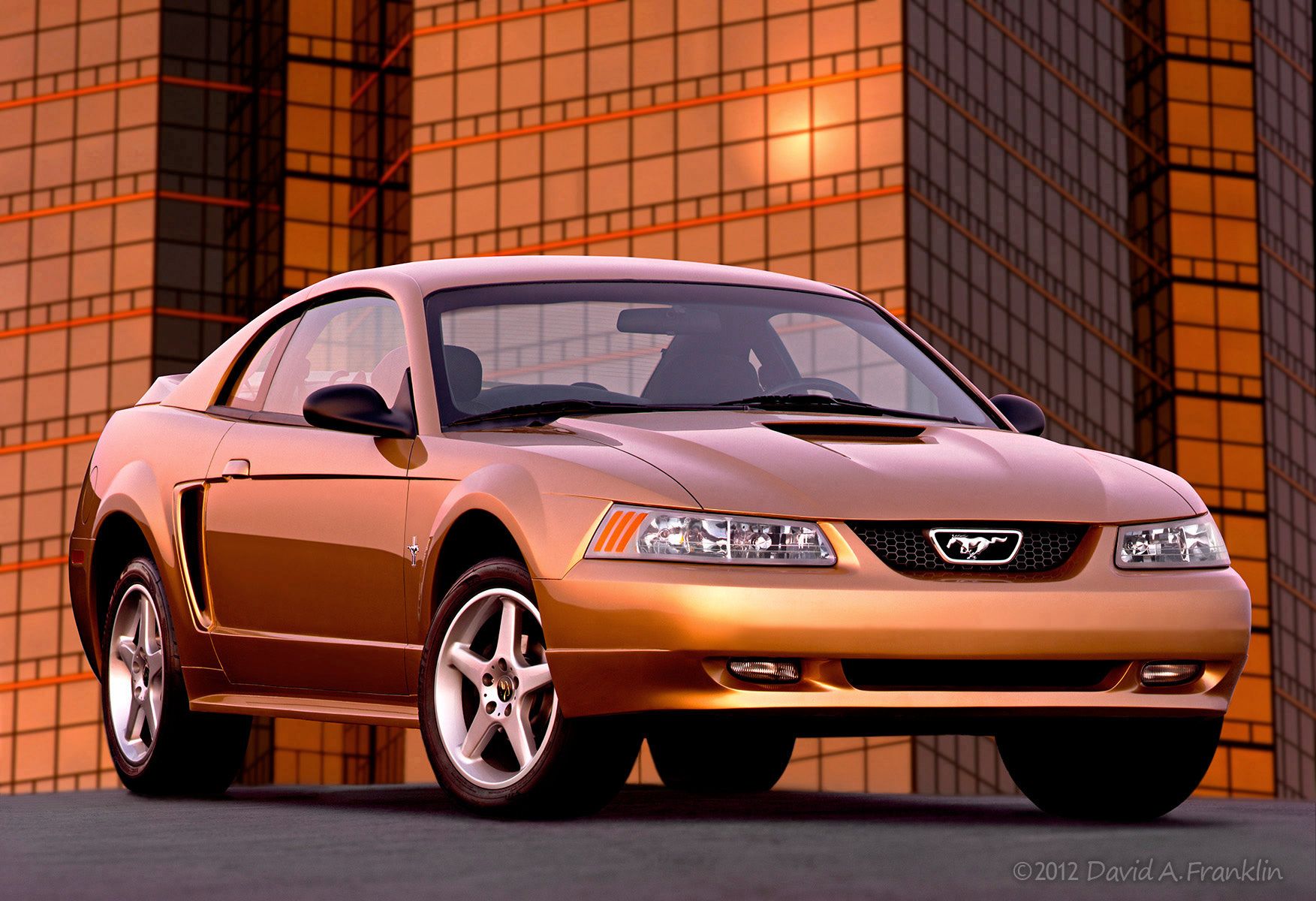 FordMustang_Gold_F34_Sunset-LitOfficeBldg