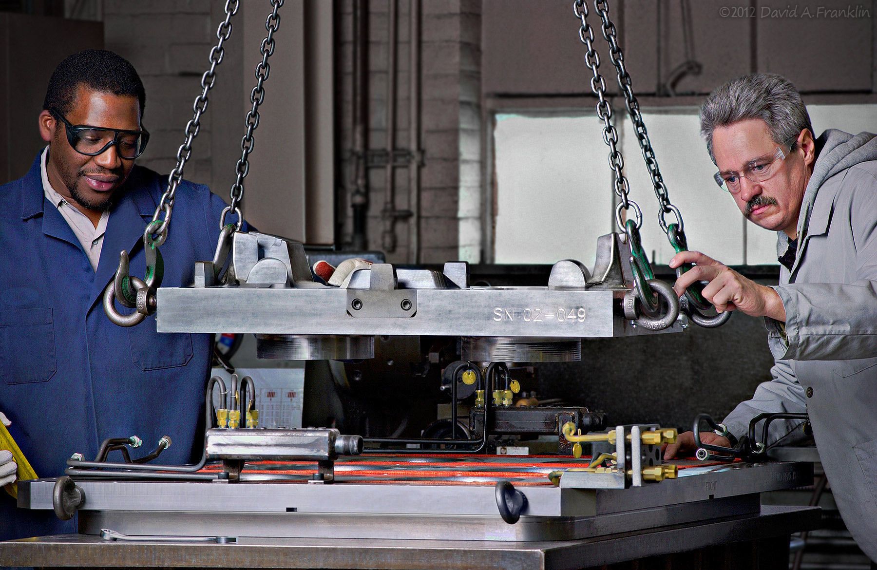 TwoManToolAlignment_InFactory_HayesLemmerzLemmerz_Advertising