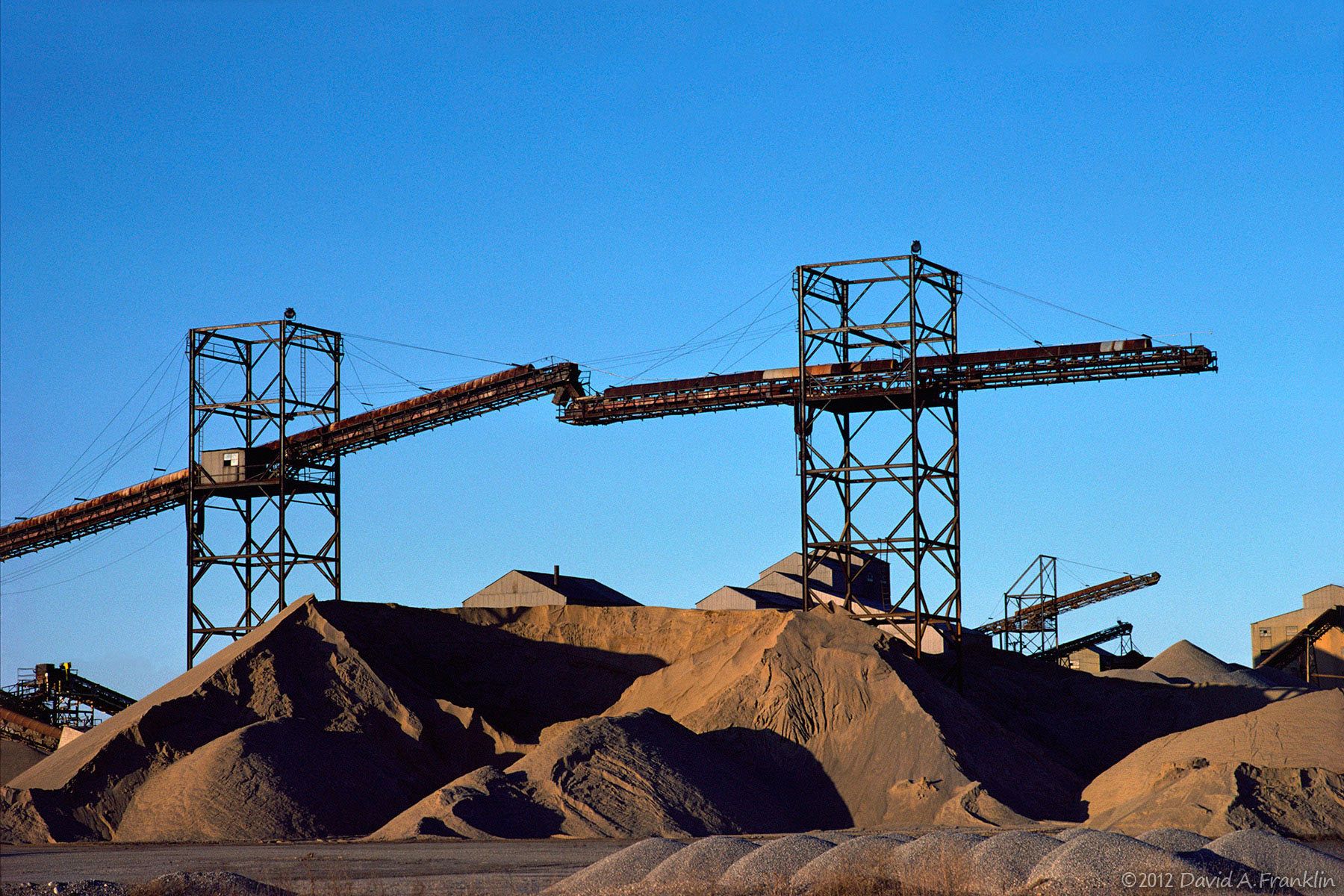 MoundsOfStoredSand&Gravel_GiantConveyorSystem_Editorial