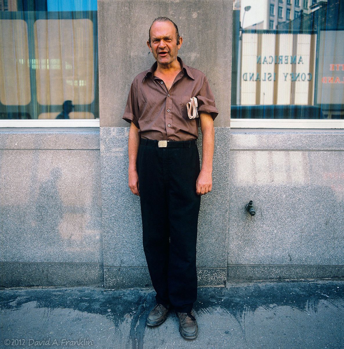 Panhandler_Jim_TellingHisHardLifeStory_DowntownDetroit_Editorial
