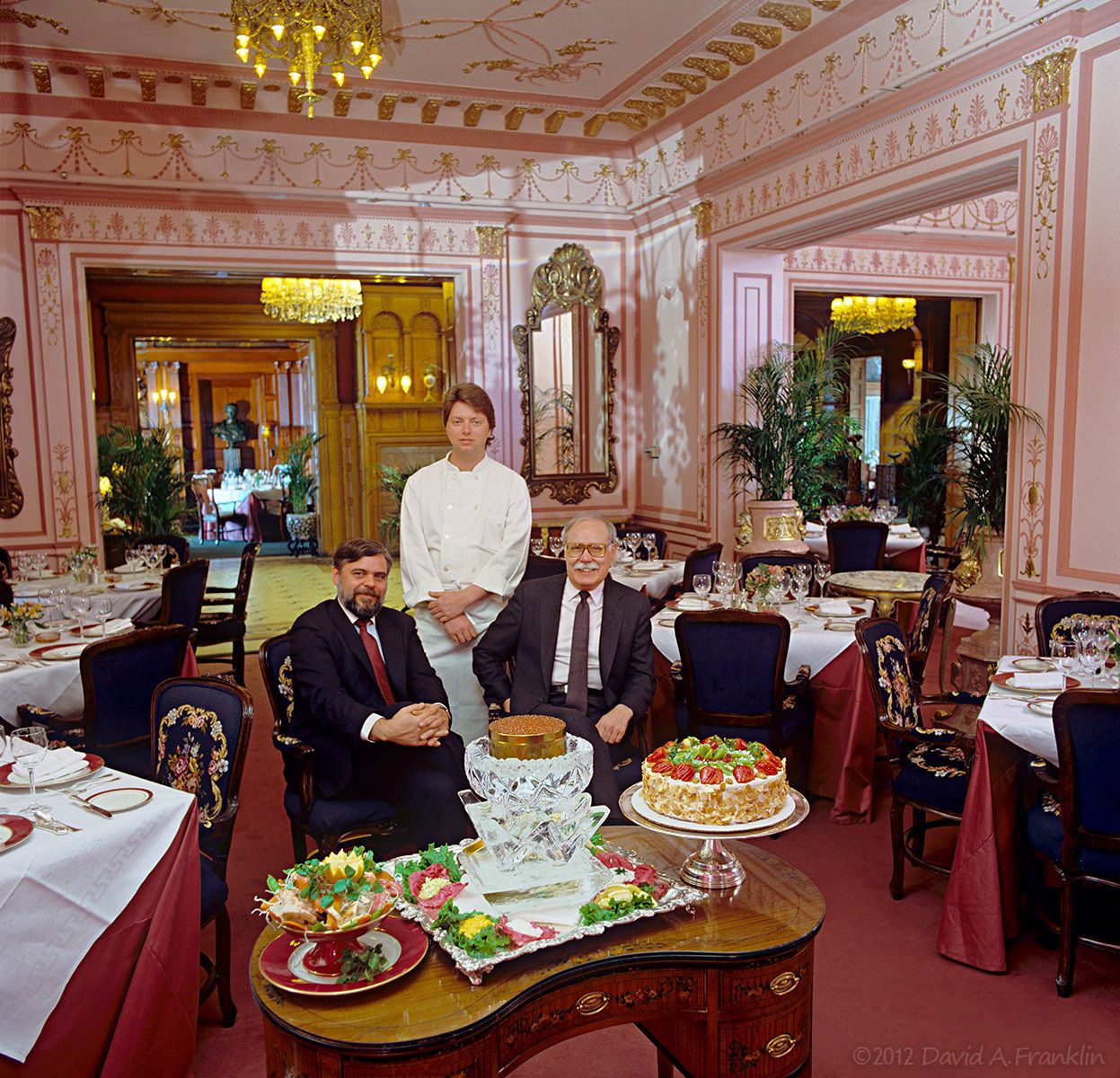 Owners-JohnMcCarthy&RonFox_ChefJeffBaldwin_FoodArrangedAtTable_DiningRoom_VanDykePlace_Editorial