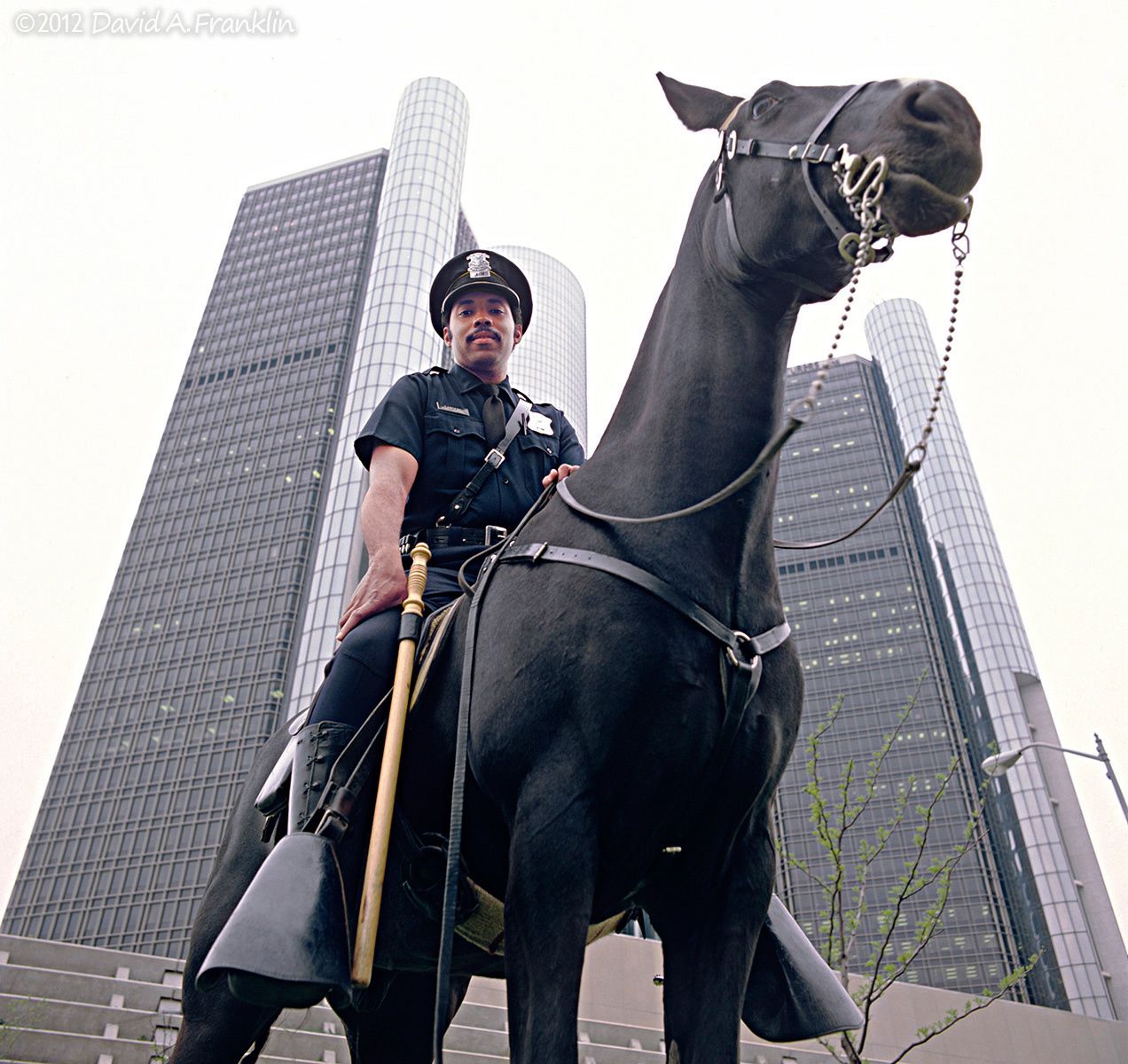 DetroitPoliceOfficer_MichaelSanders_MountedOnHisHorse_Downtown_Editorial