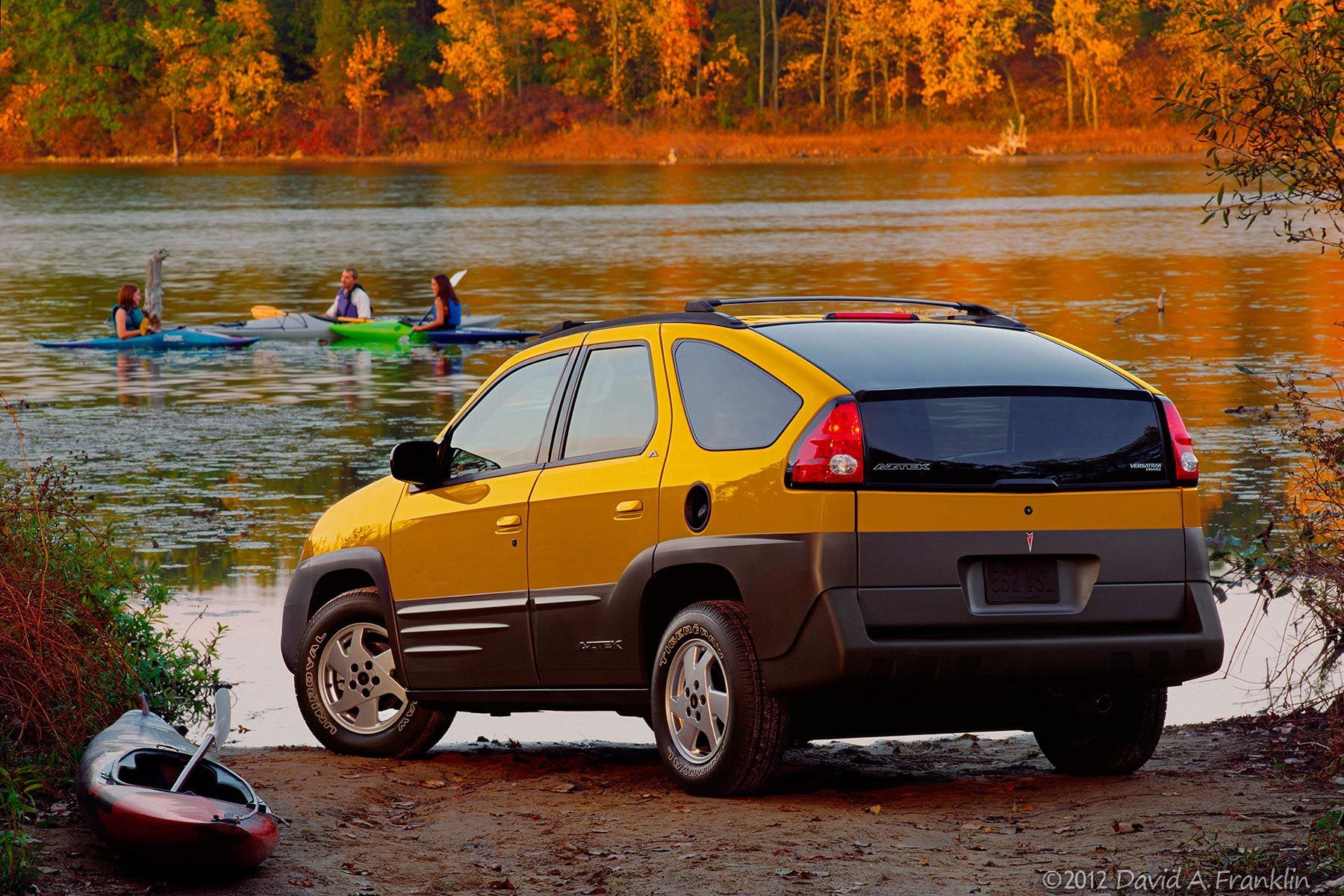 PontiacAztek_Yellow_R34_OnLakeShore_Kayakers