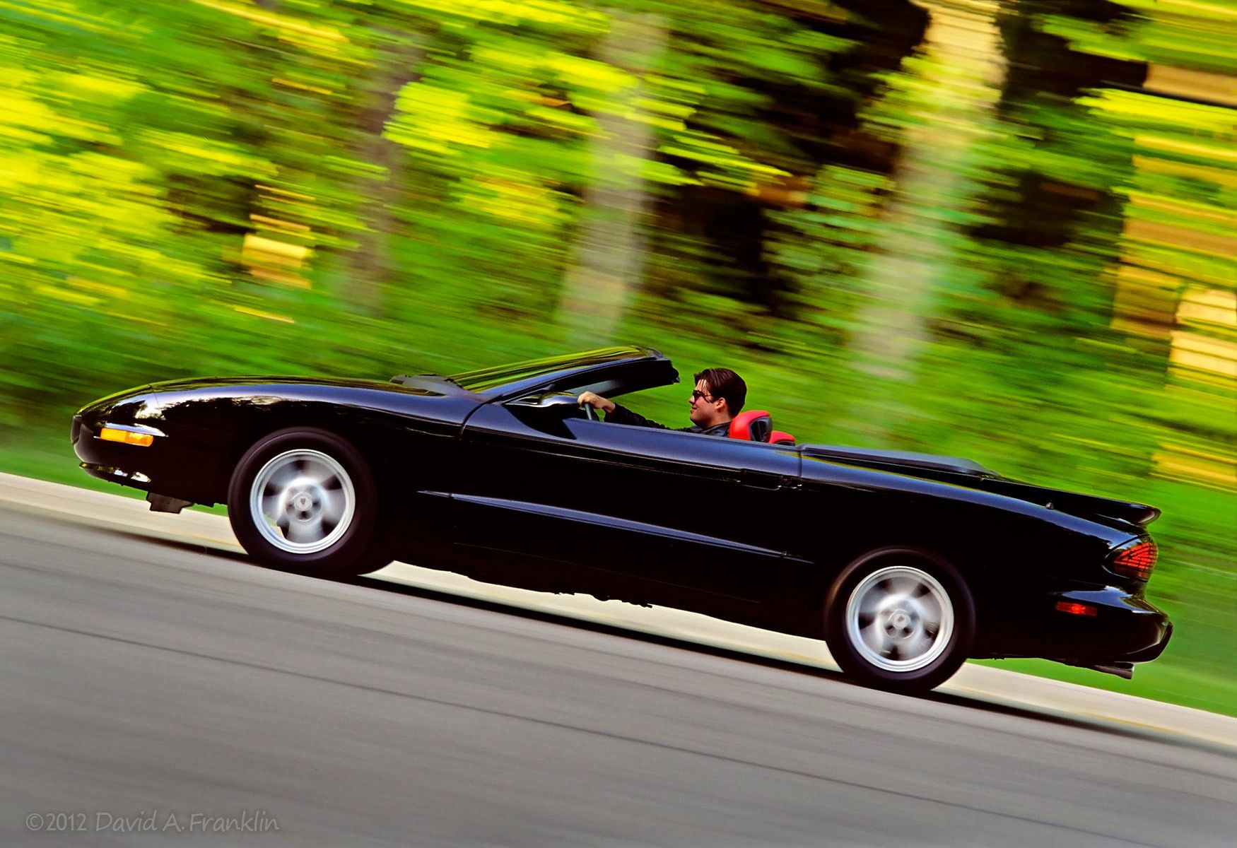 PontiacFirebirdConvertible_Black_Action-PanBlur_GreenTreeline