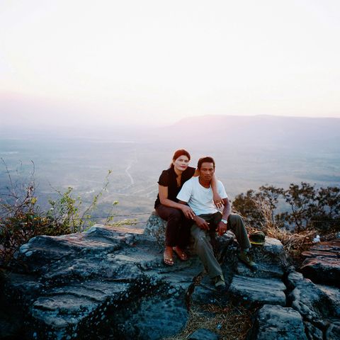 A former Khmer Rouge soldier, Vong age 42, with his wife Mon. They are married two years ago, live together at the front lines.