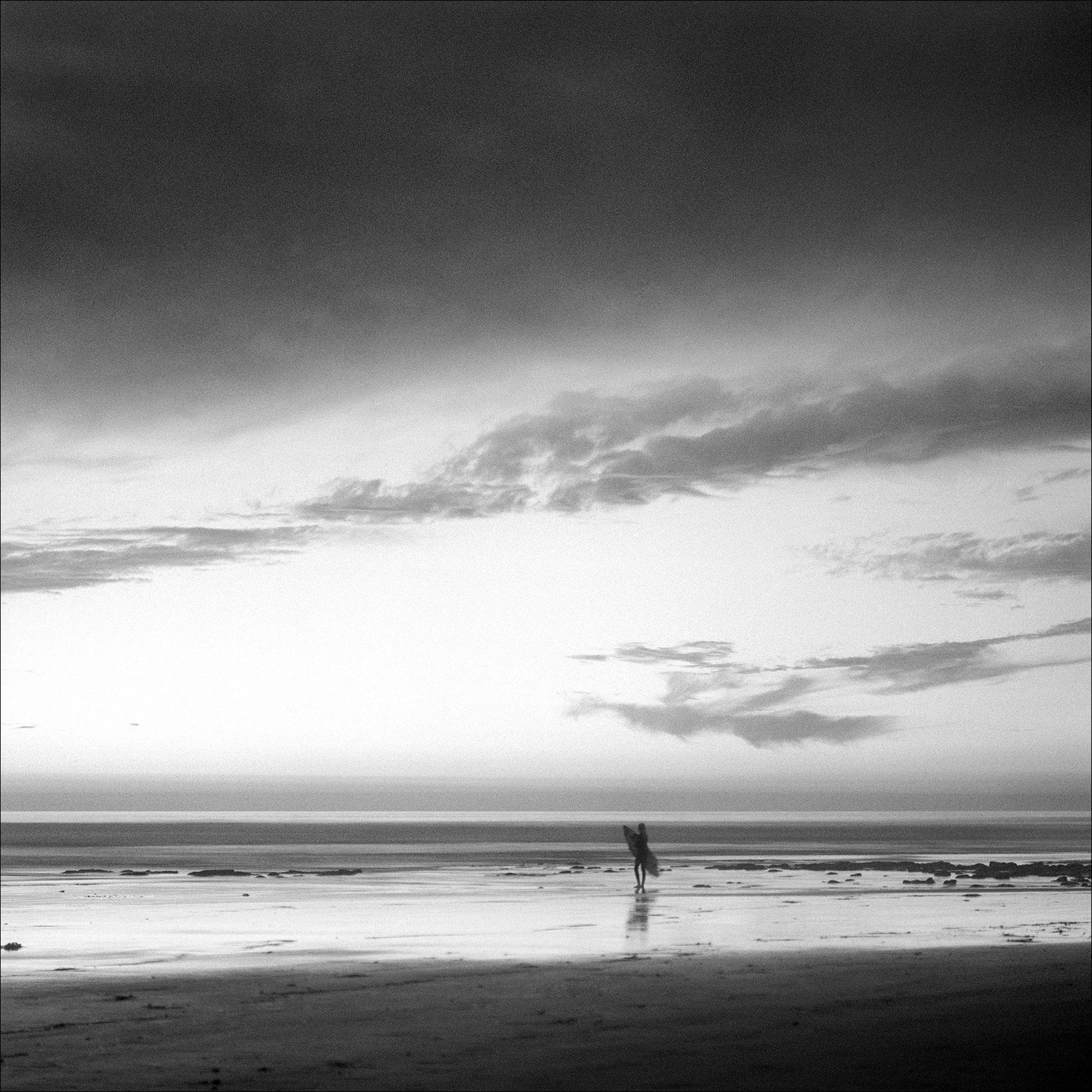 California_LoneSurfer_Sunset_BlackandWhite_Photography.jpg