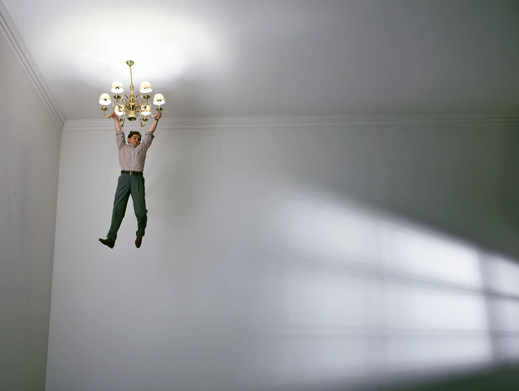 1guy_hanging_chandelier.jpg