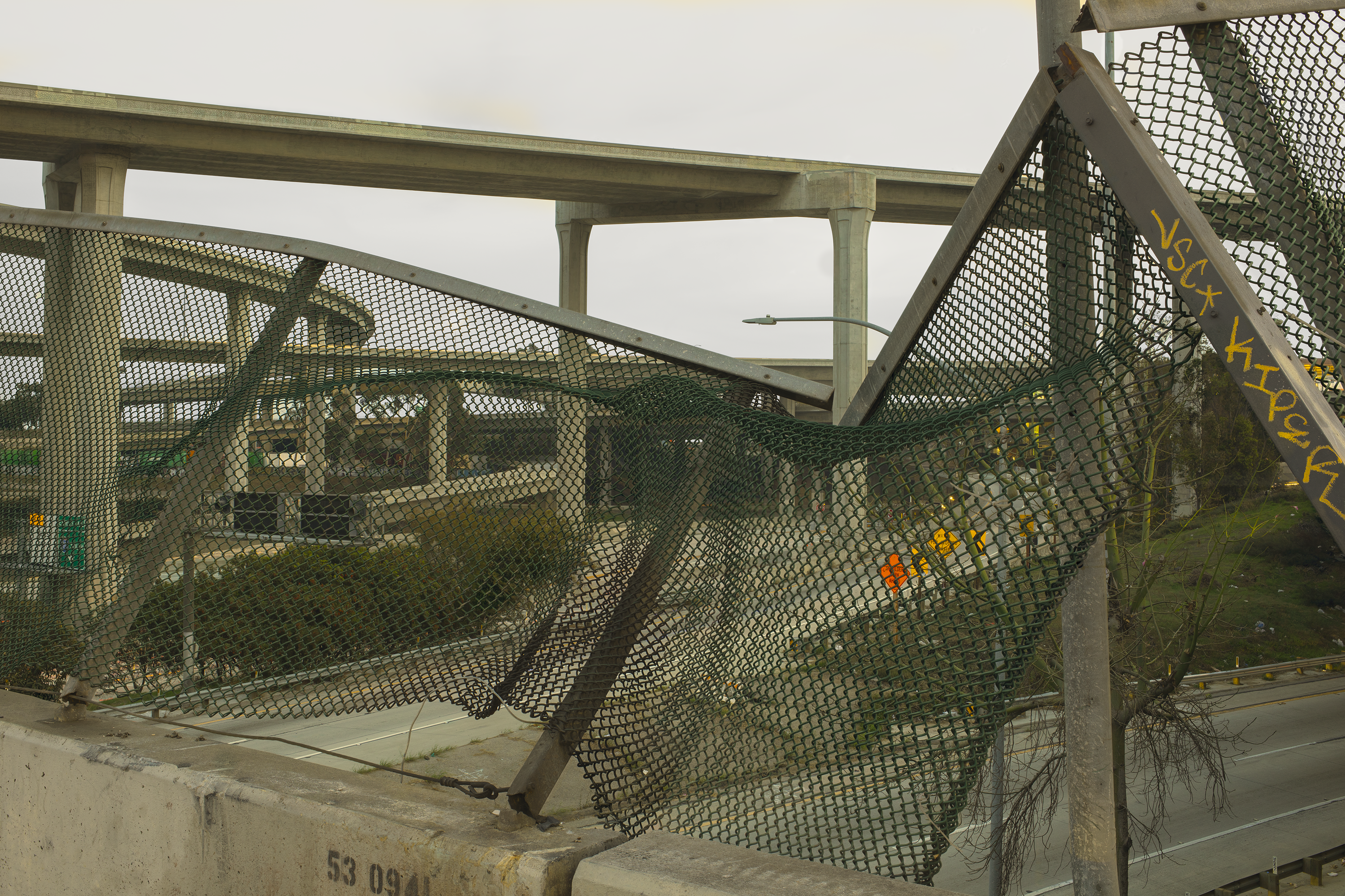 110:105 interchange deformed fence 2025-11-18-15.43.13 ZS retouched.png