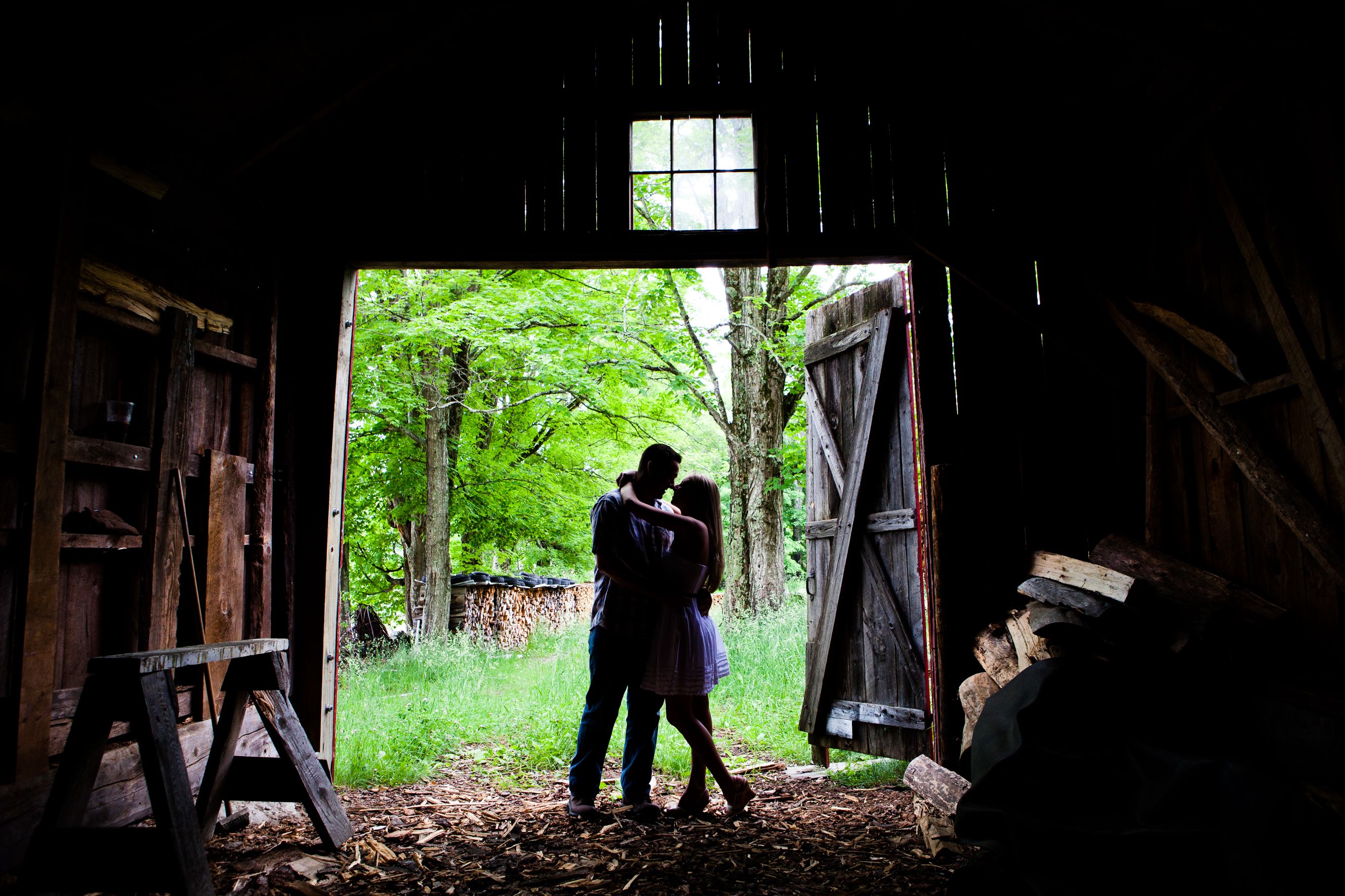 Young couple in old barn