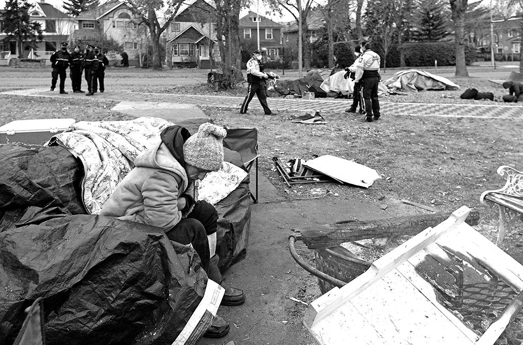 Police and peace officers move into a homeless camp at Light Horse Park in Edmonton, Canada on November 5, 2020 to facilitate the re-location of the residents from the camp and close the park.