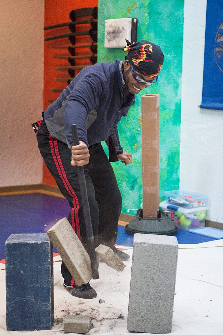 101760_arnis_instructor_david_semanas_breaking_bricks_with_baton_water_mountain_20140401_dsc0232_new.jpg
