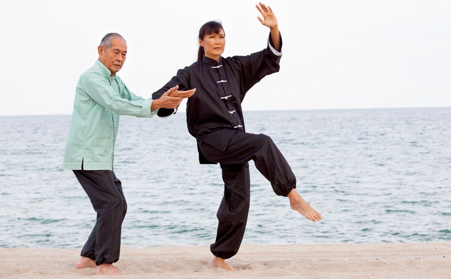 1Asian_senoir_man_teaching_Tai_Chi.jpg