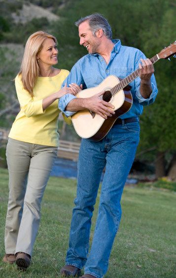 1Man_serenading_walking_with_a_woman.jpg