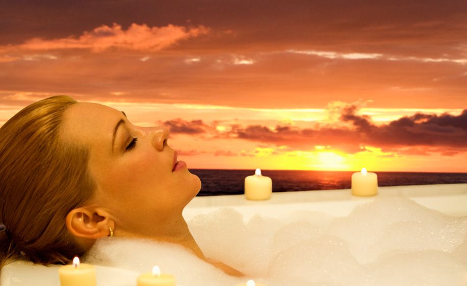 1Woman_relaxes_in_a_spa_resort_at_sunset.jpg