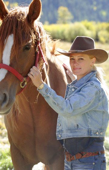 1Portrait_of_a_cowgirl_with_her_horse.jpg