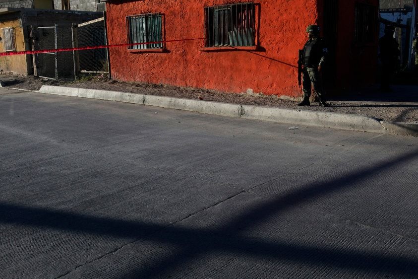 Soldier in the streets of Juarez, Mexico during fighting with the cartels.