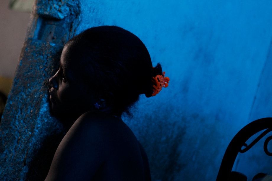 A Haitian attends a clinic run by a US volunteer doctor.  