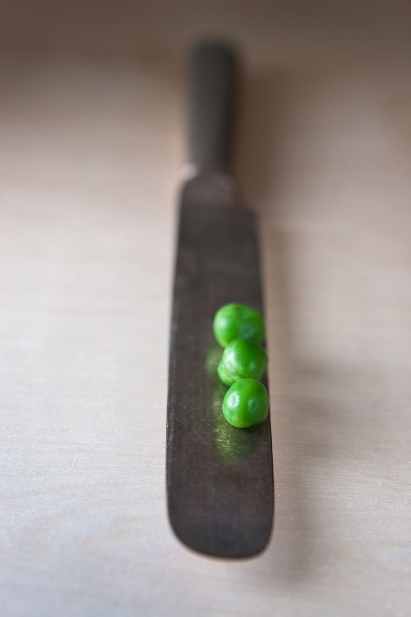 Peas on a knife