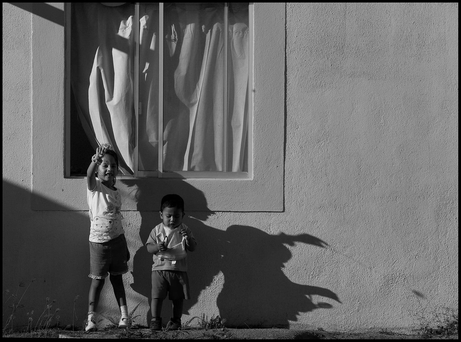 Children and shadows, Miramar. Cabo San Lucas Mexico