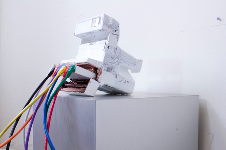 A work in progress installation about how the technology that produced physical instant images from polaroid cameras transitioned into the technology that produced data file based images that exist instantly on smartphones, the internet, and apps like instagram. The Photographic Moment of Transcendent Transition: installation View