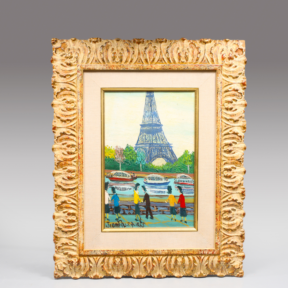 Auction photography of a Jean Busquets oil painting depicting a Seine riverbank scene with figures and the Eiffel Tower Paris, in ornate gilt carved wood frame. Photographed for I.M. Chait Gallery and Auctioneers and featured on LiveAuctioneers by Los Angeles commercial photographer Victor Koroma. Jean Busquets Eiffel Tower Oil Painting — I.M. Chait LiveAuctioneers Victor Koroma