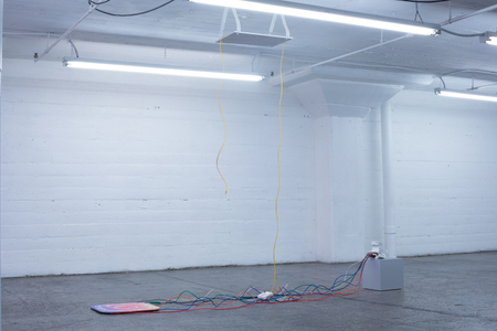 The Photographic Moment of Transition is an installation that illustrates the transition of a particular point in the history of photography. It’s a sculptural historical record showing how the technology that produced physical instant images from polaroid cameras transitioned into the technology that produces instant file based JPEGS on smartphones. It evaluates how people consumed instant images as physical polaroids to how people consume instant images as JPEG files on Instagram. New forms of technology replace old forms of technology and the medium of photography is apart of that evolutionary process. The Photographic Moment of Transition: Installation View