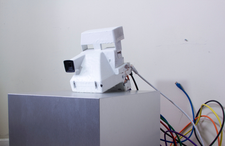A work in progress installation about how the technology that produced physical instant images from polaroid cameras transitioned into the technology that produced data file based images that exist instantly on smartphones, the internet, and apps like instagram. The Photographic Moment of Transcendent Transition: installation View