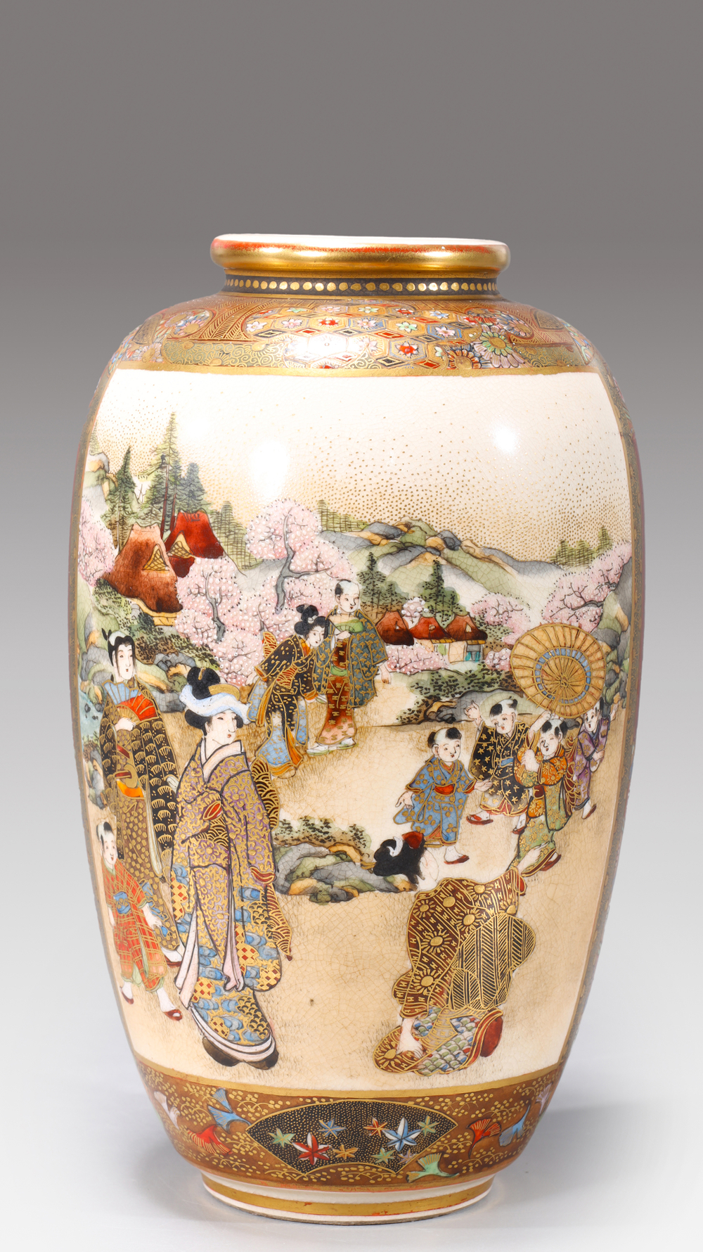 Auction photography of an antique Japanese Satsuma earthenware vase, Meiji period 1868–1912, with polychrome enamel figural garden scene depicting bijin and courtiers with cherry blossoms and gilt detailing. Museum and auction collection photography by Los Angeles commercial photographer Victor Koroma. Meiji Period Japanese Satsuma Vase — I.M. Chait Auction Photography