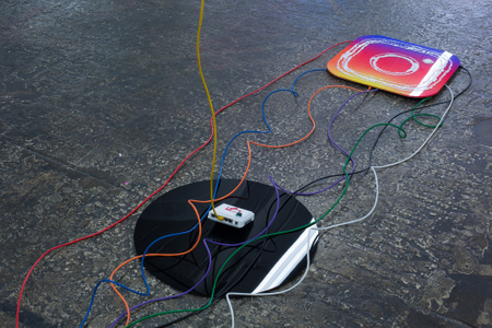The Photographic Moment of Transition is an installation that illustrates the transition of a particular point in the history of photography. It’s a sculptural historical record showing how the technology that produced physical instant images from polaroid cameras transitioned into the technology that produces instant file based JPEGS on smartphones. It evaluates how people consumed instant images as physical polaroids to how people consume instant images as JPEG files on Instagram. New forms of technology replace old forms of technology and the medium of photography is apart of that evolutionary process. The Photographic Moment of Transition: Installation View