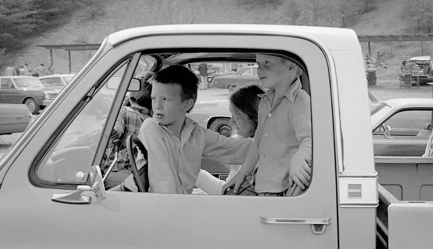 Family in Pick-up Truck.