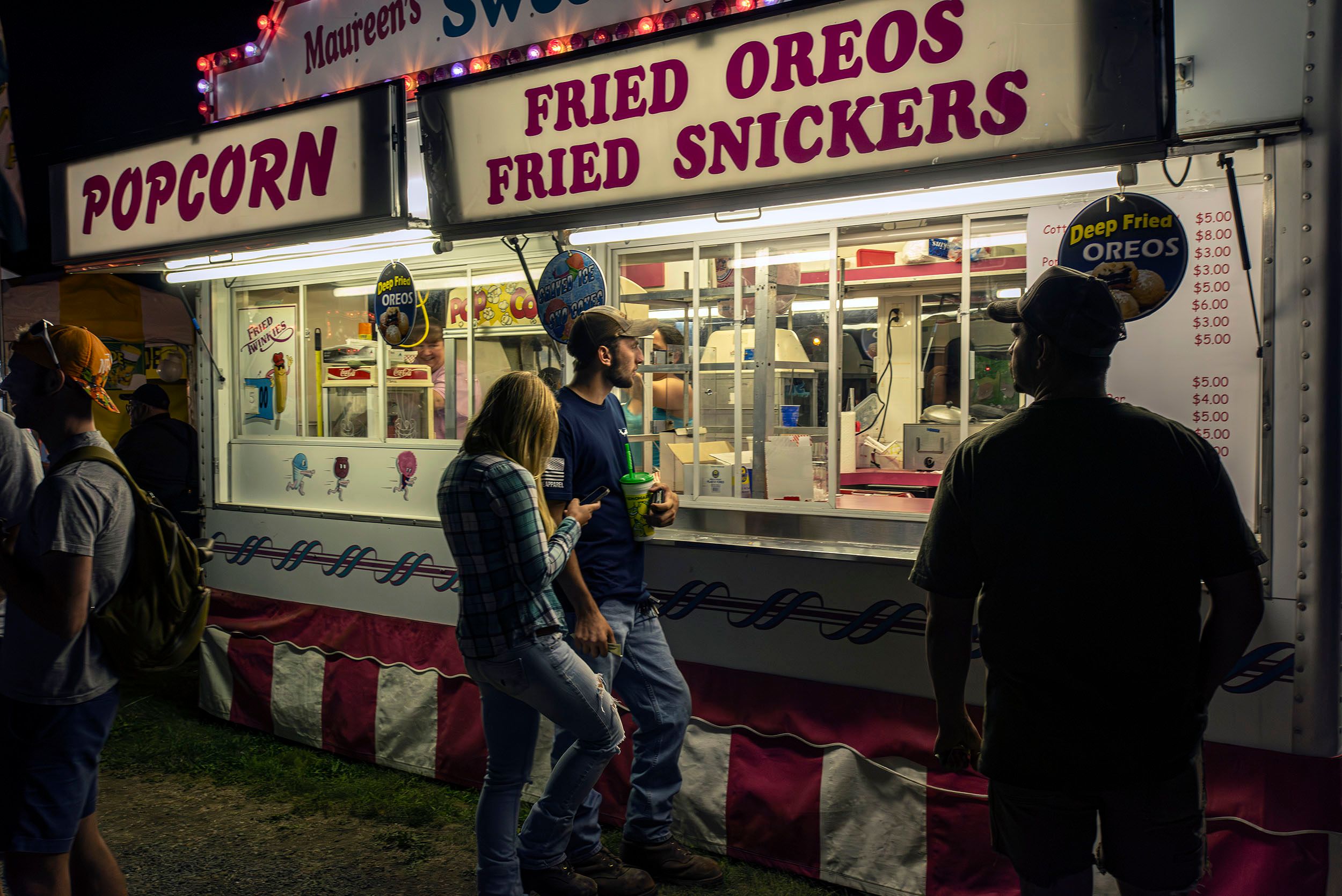 People looking for junk food at a food trailer. Blandford Fair, Blandford, MA Blandford Fair