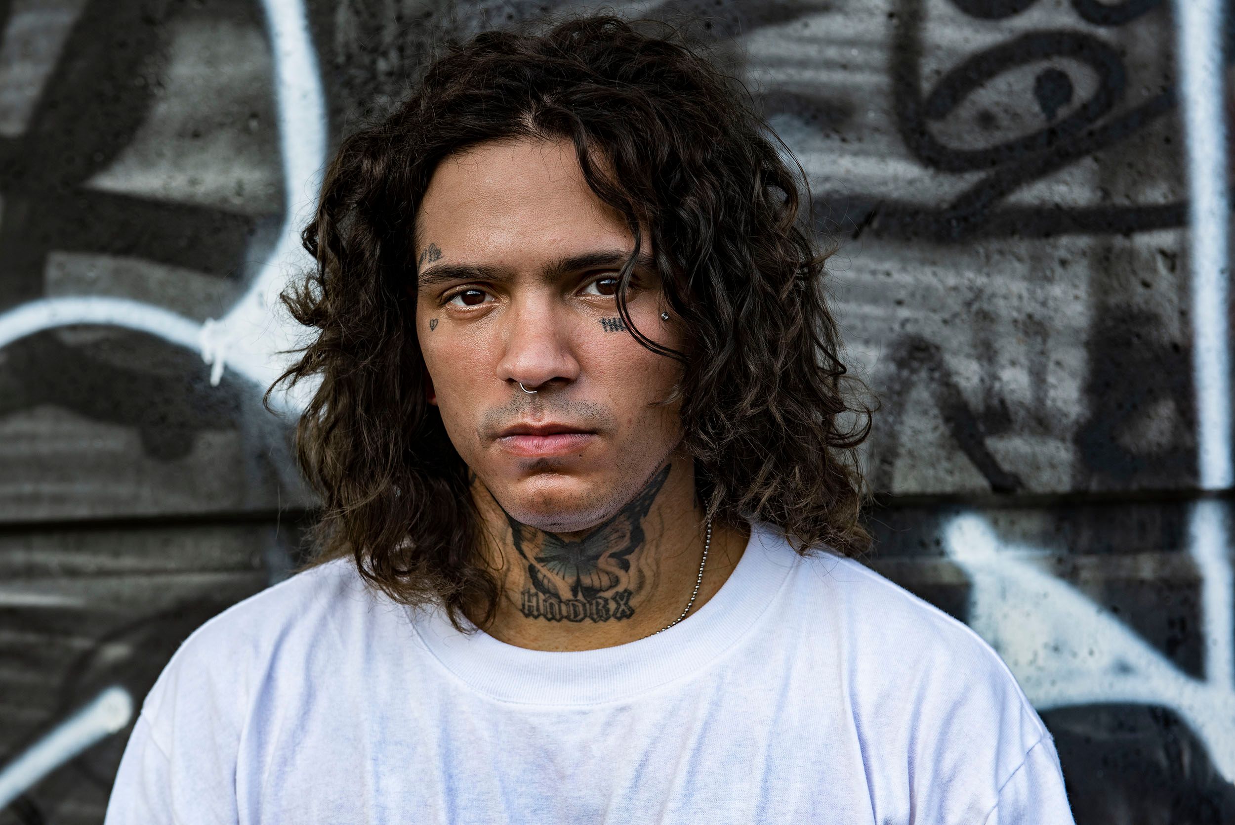 Photographic portrait of Rico Sixx, musician and skateboarder at the Lynch Family Skateboard Park. Cambridge, MA Rico Sixx
